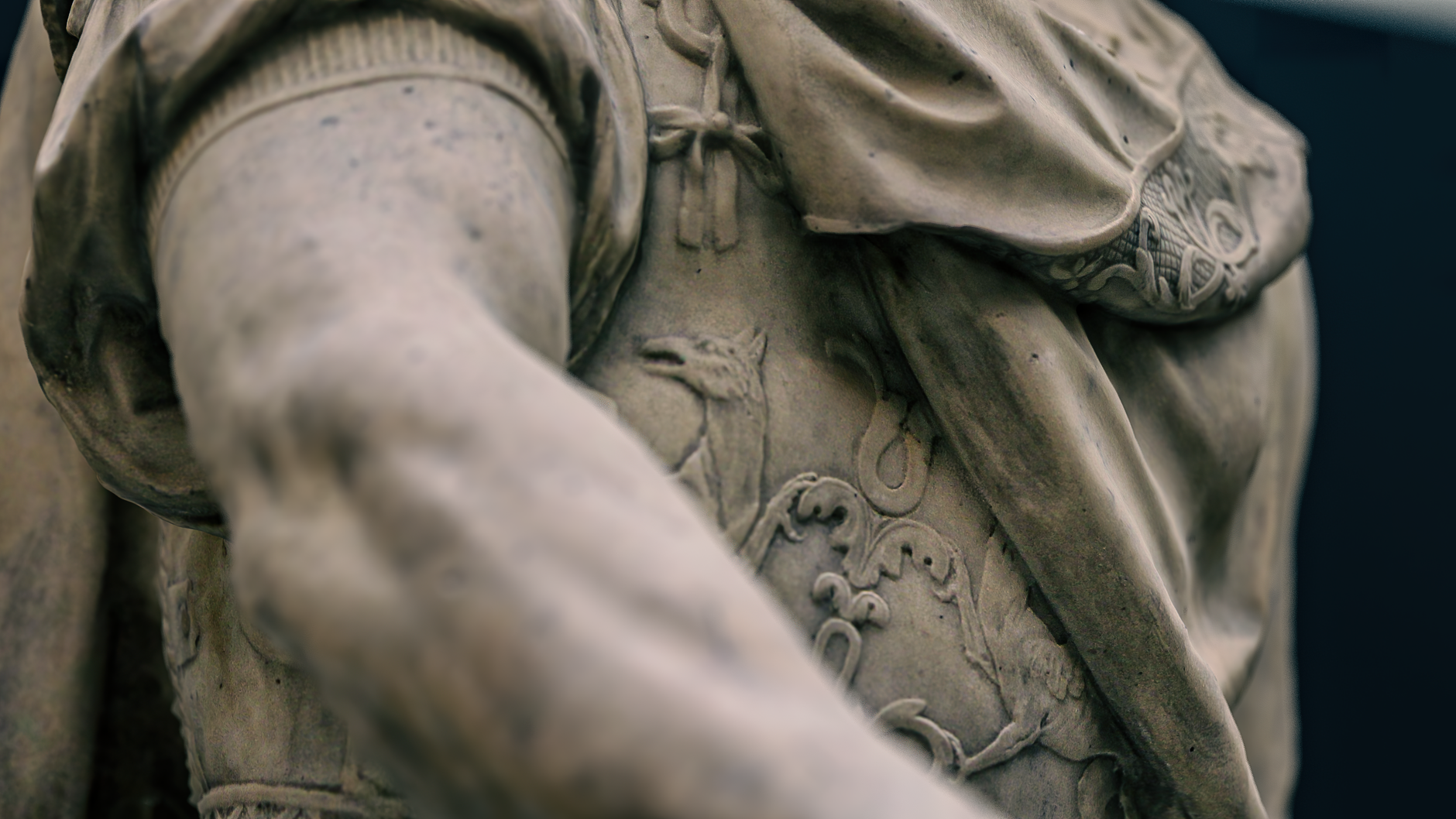 Close-up photo of an intricately carved stone sculpture showcasing detailed craftsmanship. — Julius Caesar The Man Who Change